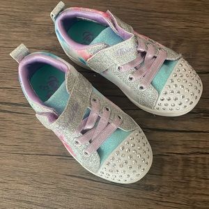Sketchers sneakers. Kids size 8. Light up. In good condition.